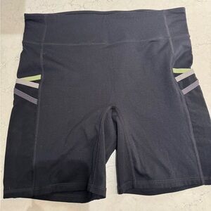 Fabletics Black and Green Bike Shorts with Compression Fit